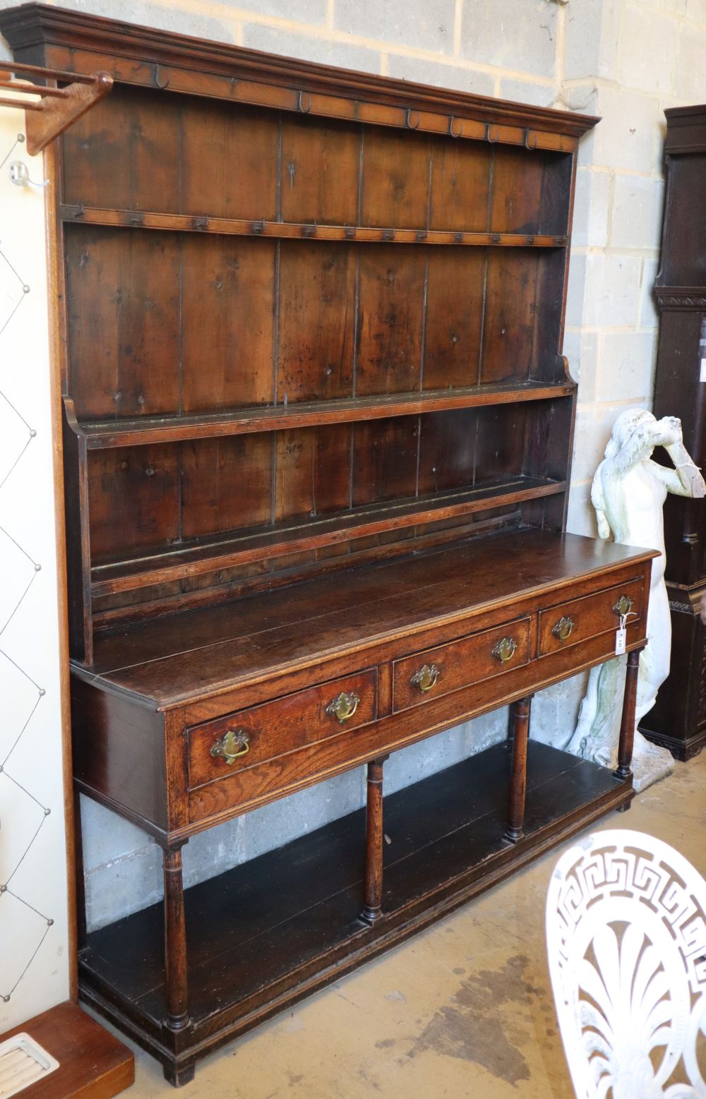 An 18th century oak pot board dresser, W.172cm, D.44cm, H.197cm